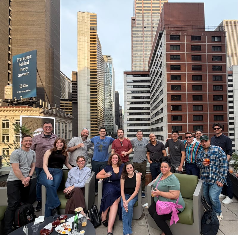 OTS staff enjoying happy hour on a rooftop in NYC